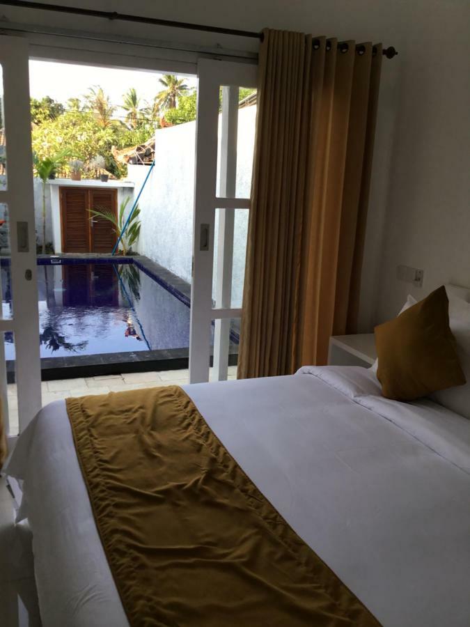 Queen Guest House Tulamben Bagian luar foto